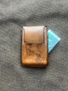 Portfel skórzany minimalistyczny rękodzieło z herbem rodu Starków, wilkiem