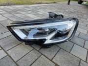 REFLEKTOR LAMPA BI XENON AUDI A3 8V0941005E LEWA*** UCHWYTY CAŁE ***