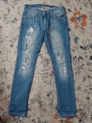 Spodnie jeansowe LEE z dziurami