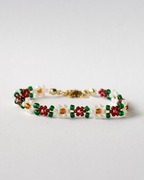 Bransoletka w kwiaty ręcznie wykonana, biała, czerwona, zielone listki