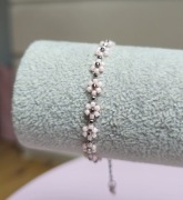 Pleciona bransoletka kwiatki pudrowy róż