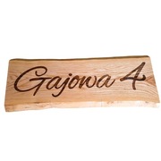 Szyld na drewnie. Szyld na desce jesionowej