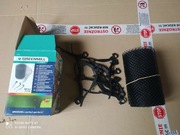 Siatka zabezpieczająca do rynny