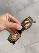 Niesamowite okulary przeciwstoneczne, trend 2025 versace