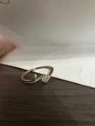 Złoty pierścionek zaręczynowy 585 1.60g DIAMENT 0,02ct 