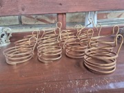 Metalowe uchwyty do szklanek