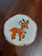 Boże Narodzenie. Dekoracja stołu. Renifer plaster  drewna. 