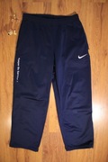 Spodnie Nike r. S męskie długie sportowe poliestrowe niebieskie