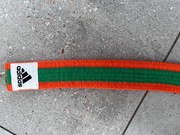pas pomarańczowo-zielony Adidas 130 cm