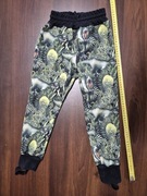 Spodnie softshell MAMMAMIA roz. 122 zielone w dinozaury
