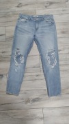 Sinsay jeansy z dziurami i przetarciami