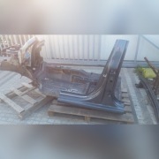 Skoda Superb II słupek środkowy Lewy