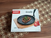 Patelnia żeliwna Banquet Grada z drewnianą deską – nowa, nieużywana