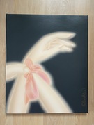 Obraz dłoń z kokardką