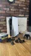 PlayStation 5 (PS5) z napędem + 2 pady + 6 gier + stacja ładowania