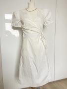 Biała sukienka kopertowa Vila 34 XS bawełna krótki rękaw midi