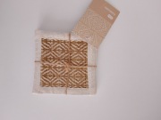 cztery kwadratowe podkładki na stół marki Eloy, wykonane z plecionki