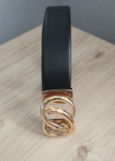 Męski czarny skórzany pasek ze złotą klamrą