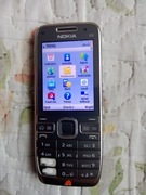 Uszkodzony ale sprawny telefon NOKIA E52 srebrny w komplecie z ładowarką 