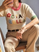 Kremowy sweter damski na krótki rękaw puszysty miły Ciao Bella na wiosnę