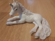 Schleich Bayala leżący jednorożec