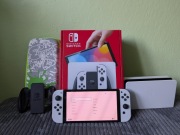 Nintendo Switch OLED 64GB + pokrowiec + karta microSD 128GB - stan idealny