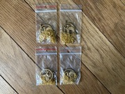 Łańcuszek wisiorek zestaw łańcuszków wisiorków igrzyska śmierci kosogłos