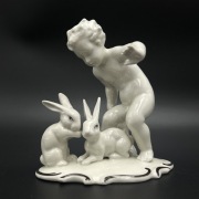 Figurka porcelanowa:”Chłopiec z królikami” Schaubach Kunst,Wallendorf