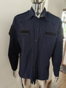 Koszula Tillhör Polisen 