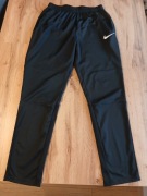 Spodnie dresowe Nike rozmiar.M bez śladów użytkowania.