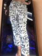 Spodnie Asos motyw gazety