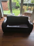 Sofa skórzana dwuosobowa z funkcją spania ciemny brąz 