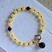 BRANSOLETKA Z BURSZTYNU KULKI BURSZTYNOWE SREBRO POZŁACANE 