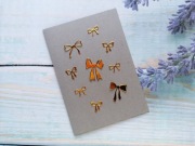 Scrapki złote kokardki mix 9szt