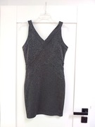 czarna cekinowa sylwestrowa sukienka imprezowa z dekoltem V bandazowa