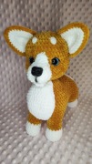 Maskotka pies Corgi.