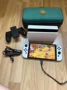 Nintendo Switch OLED + akcesoria (stan idealny), zakupione 12.2024