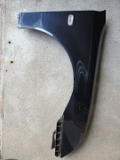 Błotnik przednie prawy Saab 9-3 II cabrio kolor 290 uszkodzony