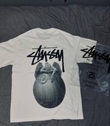 Biała koszulka stussy z aniołem