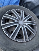 Felgi stalowe z oponami i kołpakami Ford Focus 6jx15x49,5