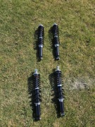 Amortyzatory olejowe CF Moto 850 G3 – komplet przód + tył, jak nowe