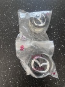 Dekielki oryginał Mazda 4szt oryginał 71A395