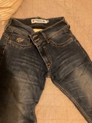 Jeansy damskie na motocykl z wzmocnieniami 