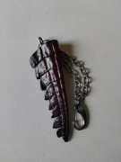 Breloczek ze skóry krokodyla.