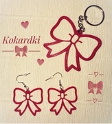 Uroczy zestaw: kolczyki i breloczek w kształcie kokardek