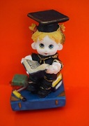 Żak , matura , student  , uczeń - mała figurka wykonana z żywicy.