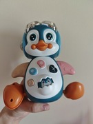 Chodzący pingwin grający interaktywna zabawka 