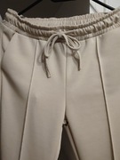 Spodnie dzwonki masełko 