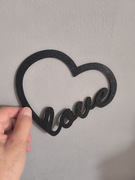 Napis love na ścianę lub na biurko albo stolik 