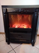 grzejnik elektryczny w formie kominka. 